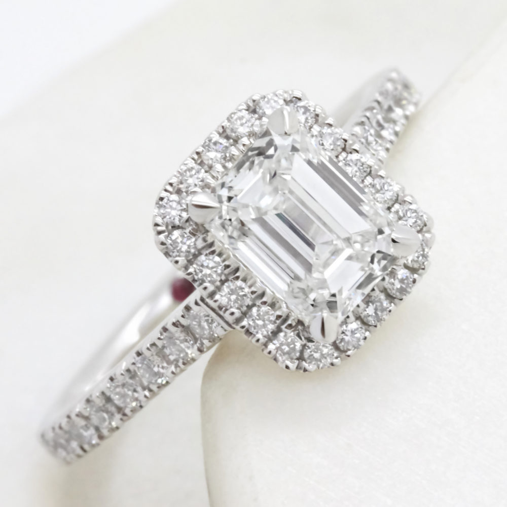 emerald cut diamond halo engagement ring