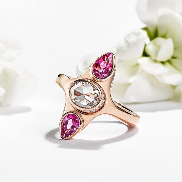 oval rose cut diamond with pear pink sapphires set in rose gold