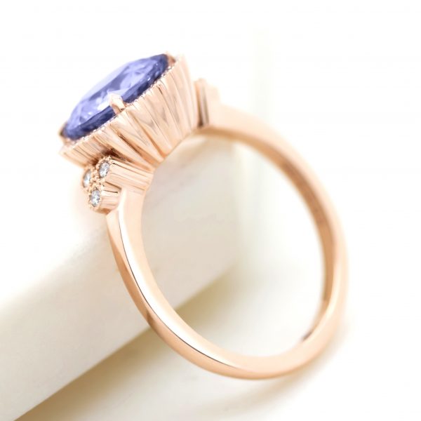 portuguese cut purple sapphire with diamond halo, accent stones and milgrain2