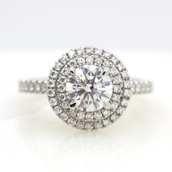 round centre diamond with double diamond halo engagement ring