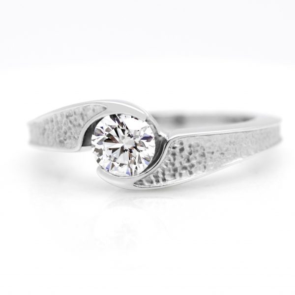 round diamond bypass set pebbled platinum engagement ring