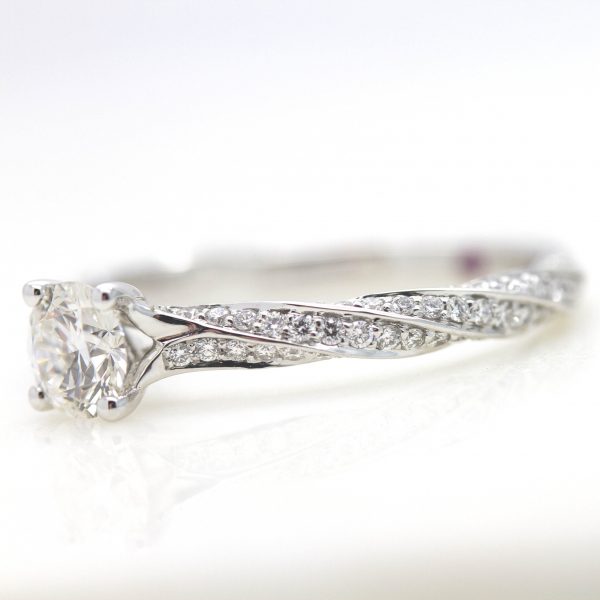 round diamond twisted diamond pave engagement ring