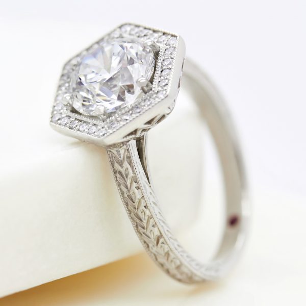 round diamond hexagonal halo engagement ring with wheat hand engraving