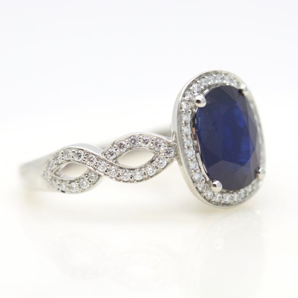 twisted pave band sapphire halo engagement ring