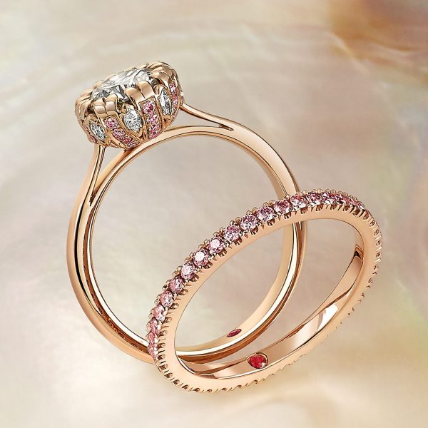 18K rose gold solitaire with white-_-pink-diamonds-set-in-the-gallery with matching wedding band
