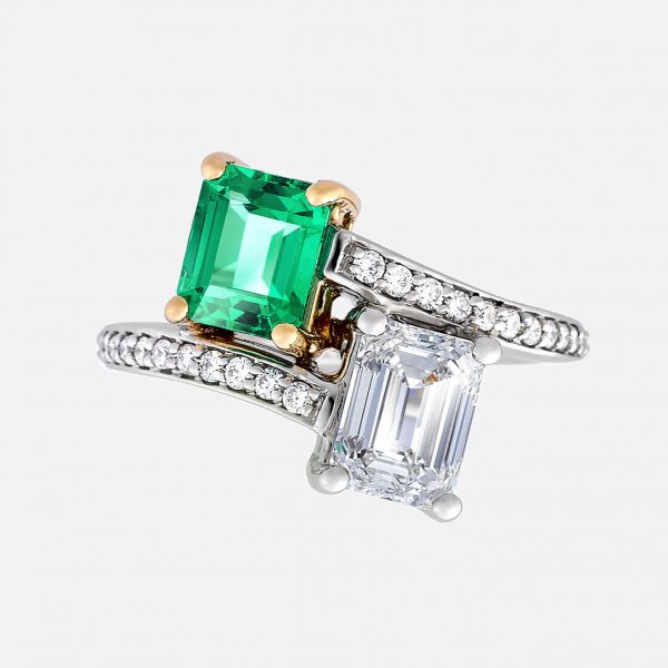 emerald cut emerald and diamond moi et toi ring