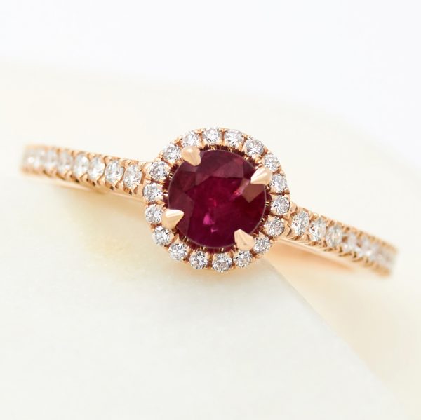 round ruby diamond halo in rose gold engagement ring